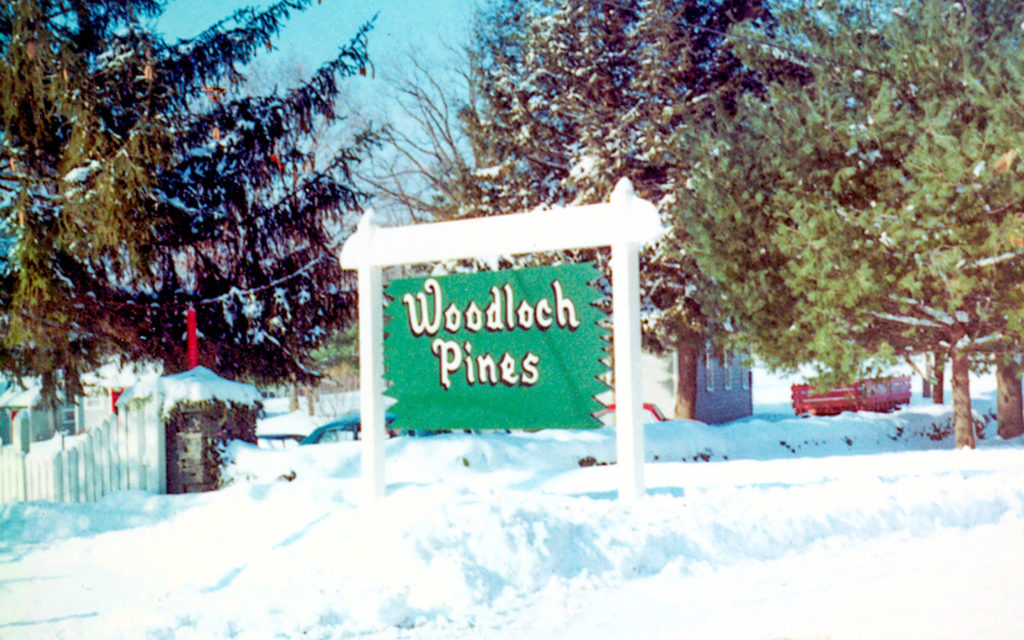 Woodloch Pines sign after snow storm.