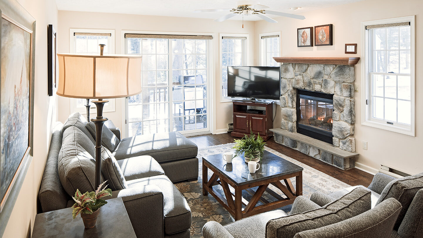 Stay in our vacation rental homes and spread out - together with your group in this charming living room space.