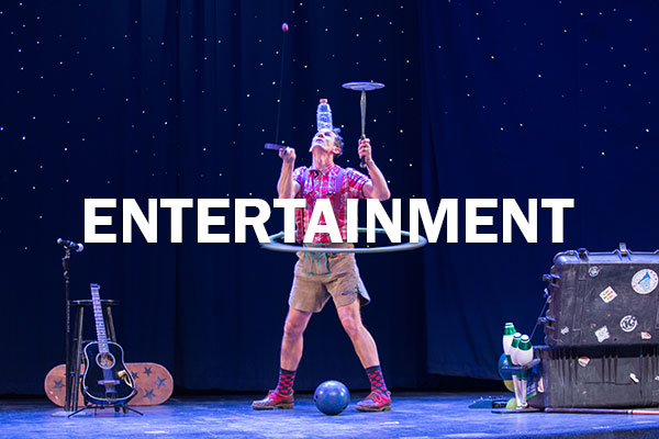 Stage performance. Text: Entertainment. Highlights of entertainment.